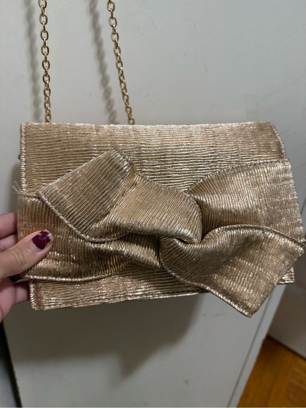 Lulu's Shimmering Gold Bow Shoulder Clutch